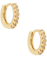 Natalie B. Jewelry - Lucy Micro Pave Huggy Hoop Earrings - Lyst
