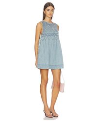 Free People - Maisie Smocked Denim Mini Dress - Lyst