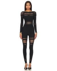 Wolford - JUMPSUIT NET LINES - Lyst