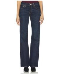 RE/DONE - Twisted Mid Rise Bootcut Jeans - Lyst