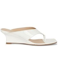 Stuart Weitzman - SANDALES VINNIE WEDGE THONG 50 en White - Lyst