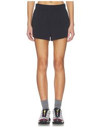 Beyond Yoga - Breeze Run Short - Lyst