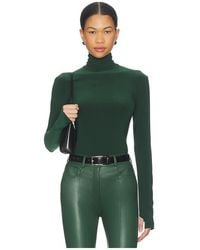 Norma Kamali - Slim Fit Long Sleeve Turtle Top - Lyst