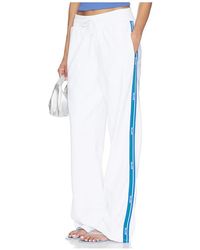 Gcds - Pantalon Sweat Logo Tape Straight En. Taille Also En M, S, Xs, Xxs - Lyst