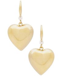 By Adina Eden - Solid Puffy Heart Huggie Earring - Lyst