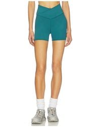 WellBeing + BeingWell - Flowwell Callista Crossover 4 Inch Short - Lyst