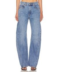 Alexander Wang - MIDE-RISE-JEANS MIT WEITEM BEIN SLOUCHY TWISTED - Lyst