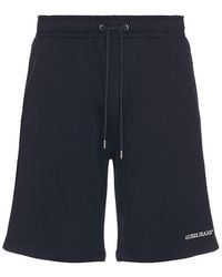 Guess - Bestickte Shorts - Lyst