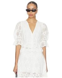 FRAME - The Deco Eyelet Tiered Blouse - Lyst