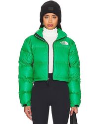 The North Face - Blouson écourté nuptse vert rembourré en duvet - Lyst