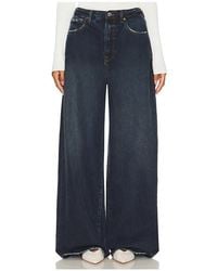 GRLFRND - Oversized Rigid Denim Flared Jeans - Lyst