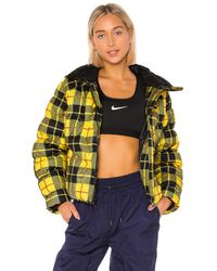 Plumíferos y chaquetas acolchadas Nike de mujer: hasta el 50 % de descuento  | Lyst