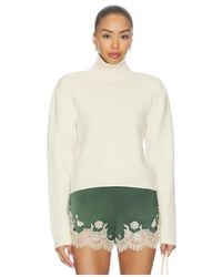 Rohe - PULL CROPPED À COL MONTANT STATEMENT SHOULDER CROPPED TURTLENECK en Cream - Lyst