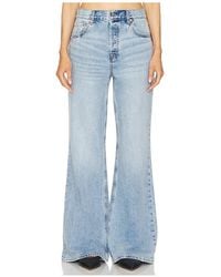 GRLFRND - JEAN FLARE TAILLE BASSE RELAXED JADE - Lyst