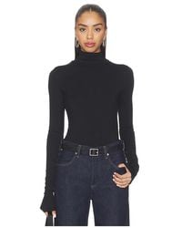 ÉTERNE - Fitted Turtleneck Top - Lyst