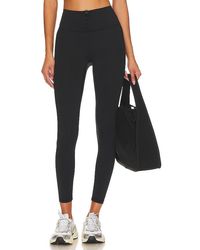 IVL COLLECTIVE - Lace Up Legging - Lyst