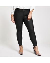 River Island - Plus Black Molly Coated Mid Rise Skinny Jeans - Lyst