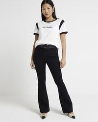 River Island - Petite Black High Waisted Flared Jeans - Lyst