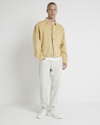 River Island - Tapered Fit Bleached Jeans - Lyst