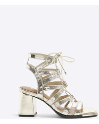 River Island - Gold Strappy Heeled Sandals - Lyst