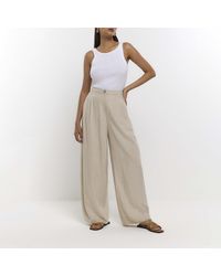 River Island - Beige Pleated Wide Leg Trousers With Linen - Lyst