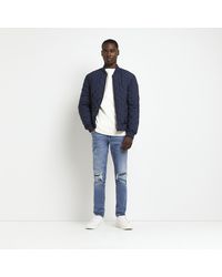 River Island - Skinny Fit Ripped Jeans - Lyst