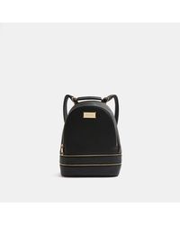 river island backpacks