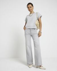 River Island - Mid Rise Wide Leg Jeans - Lyst
