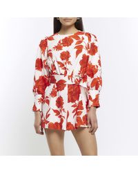 River Island - White Belted Floral Long Sleeve Playsuit - Lyst
