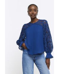 River Island - Navy Plisse Lace Sleeve Blouse - Lyst