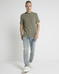 River Island - Blue Tapered Fit Jeans - Lyst