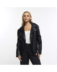 River Island - Petite Black Faux Leather Oversized Jacket - Lyst