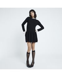 River Island - Black Knit Long Sleeve Frill Mini Dress - Lyst