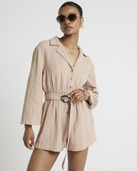 River Island - Textured Belted Playsuit - Lyst