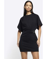 River Island - Black Wrap Buckle T-shirt Mini Dress - Lyst