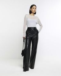River Island - Black Faux Leather Wide Leg Trousers - Lyst