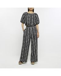 River Island - Black Abstract Print Wide Leg Trousers - Lyst