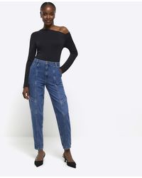 River Island - High Waisted Tapered Jeans - Lyst