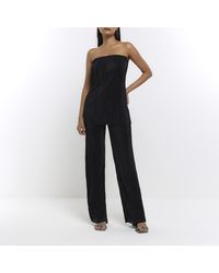 River Island - Black Plisse Flared Trousers - Lyst
