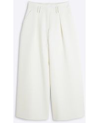 River Island - Petite Cream High Waisted Wide Leg Trousers - Lyst