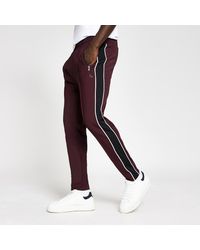 River Island - Dark Piped joggers - Lyst