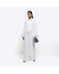 River Island - White Feather Cuff Wide Leg Jumpsuit - Lyst