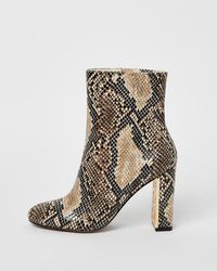 beige faux snake ankle boot
