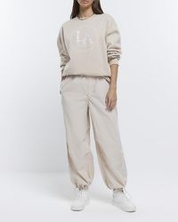 River Island Low Rise Parachute Trousers in White | Lyst