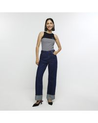 River Island - High Waisted Wide Leg Turn Up Jeans - Lyst