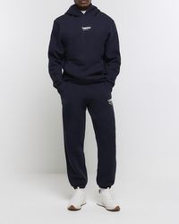 River Island - Navy Regular Fit Graphic Tracksuit Joggers - Lyst