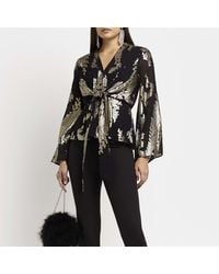 River Island - Black Printed Tie Front Blouse - Lyst