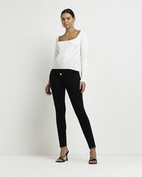 River Island - Black Molly Mid Rise Maternity Skinny Jeans - Lyst