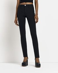 River Island - Mid Rise Skinny Trousers - Lyst