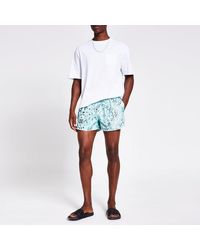 river island flamingo swim shorts